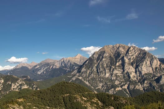 Landscape showing some high mountains under a blue sky in the Pyrenees