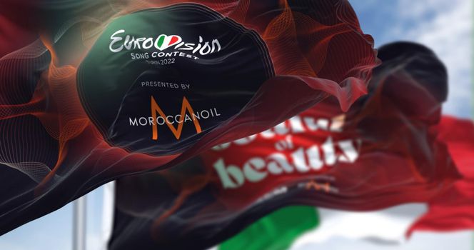 Turin, Italy, January 2022: The flags of the Eurovision Song Contest 2022 waving in the wind. The 2022 edition will take place in Turin, Italy from 10 to 14 May