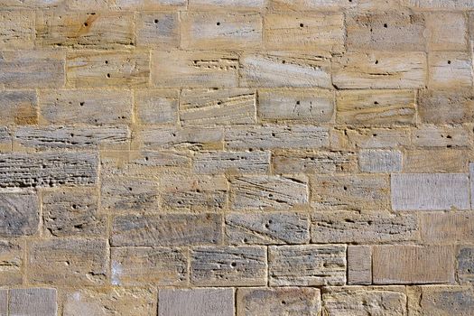 Background from an old wall made of natural stone