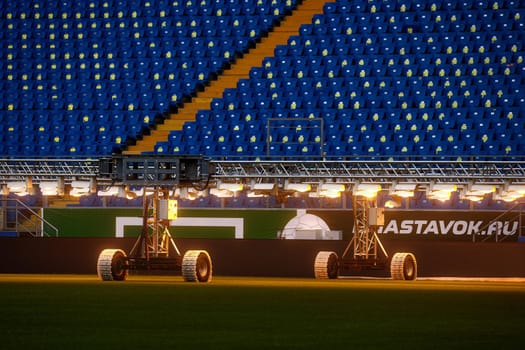 Artificial light system for growing football stadiums grass. Lamps to heat the lawn of the stadium and keep the grass in perfect condition. Lamps for football lawn.
