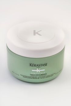 Thessaloniki, Greece - October 26 2022: Kerastase Paris Specifique Argile Equilibrante hair detox clay amino acid shampoo on 250 ml container that cleanses and purifies the scalp, on white background.