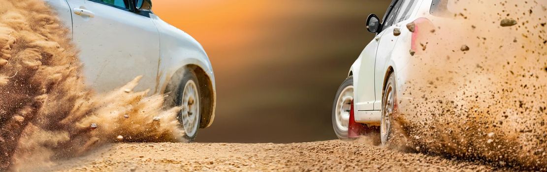 Rally race car drifting on dirt track.