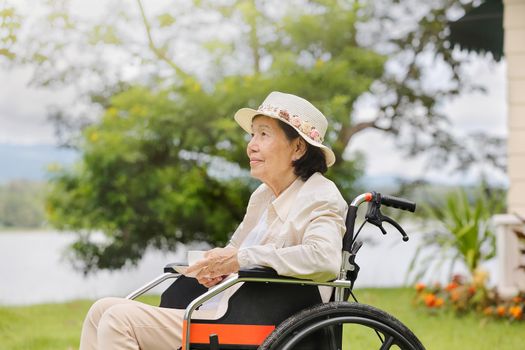 elderly woman relax in backyard