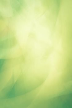 Vertical soft green background with yellow tints. Abstract spring summer. Backdrop