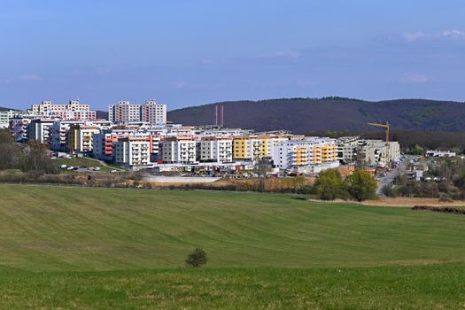 Construction of new apartment buildings in the housing estate. Concept for housing and construction of new apartments. Rising building materials and rising real estate prices.
Brno - Bystrc - Czech Republic.