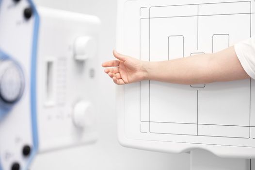 Man in x-ray room having medical scan examination in a modern hospital. High quality photo