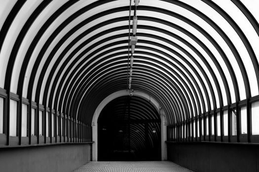 Perspective view of an entrance to North train station in Barcelona in Black and white