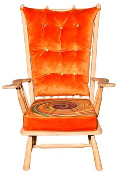 Nice comfortable wooden armchair with fastened soft cushions on the back and seat. Bright orange pattern in velor fabric.
