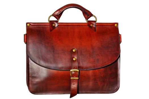 Business stylish strict leather briefcase in red-brown color with a belt buckle in the middle in vintage style isolated on white background.