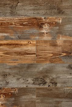 Stylish background with old cracked wooden plank wall in a coffee beige shade with cracks, knots and stains, vertical image.