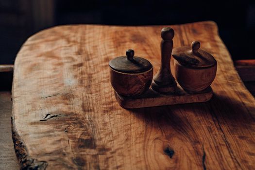 Salt shaker and pepper made of wood studio light. High quality photo