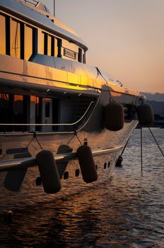 Olbia, Sardinia / Italy - 2019/8/21: Panoramic view of marina di Olbia port and yacht marina at sunset