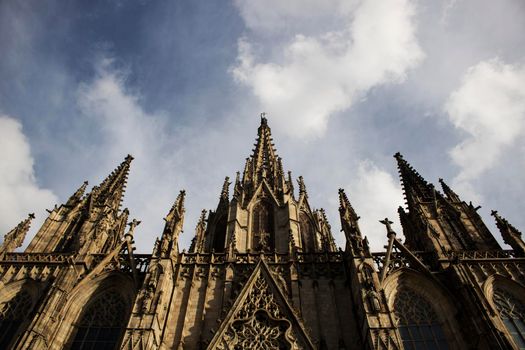 Barcelona Cathedral superior part under a cloudy sky