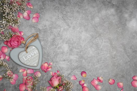 valentine's day gift in a heart-shaped box, mother's day, apples on the table and rose petals. High quality photo