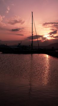 Panoramic view of marina di Olbia port and yacht marina at sunset