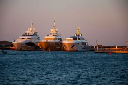 Panoramic view of marina di Olbia port and yacht marina at sunset