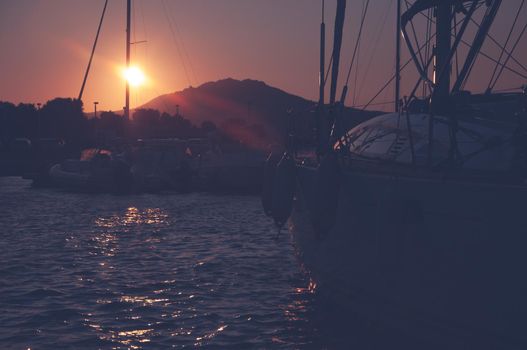 Panoramic view of marina di Olbia port and yacht marina at sunset