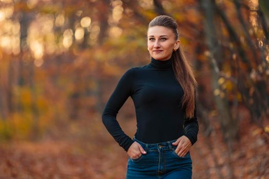 beautiful girl on the background of autumn forest