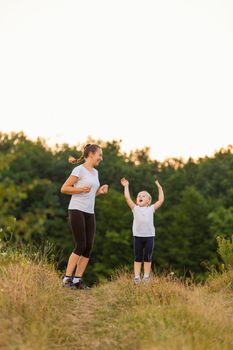 mother and daughter walking in nature