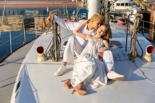 couple sitting on a yacht in the early morning