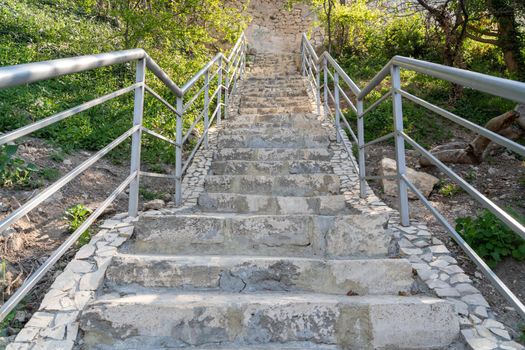 A new stone staircase of 800 steps to Jasper Beach, built in the spring of 2020. The reserve on the Black Sea. Cape Fiolent, Crimea Peninsula. The concept of unity with nature, outdoor activities