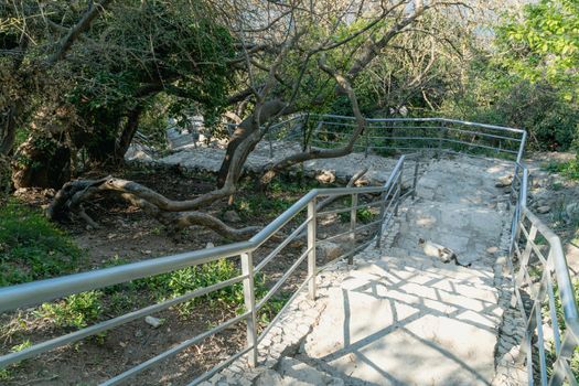 A new stone staircase of 800 steps to Jasper Beach, built in the spring of 2020. The reserve on the Black Sea. Cape Fiolent, Crimea Peninsula. The concept of unity with nature, outdoor activities