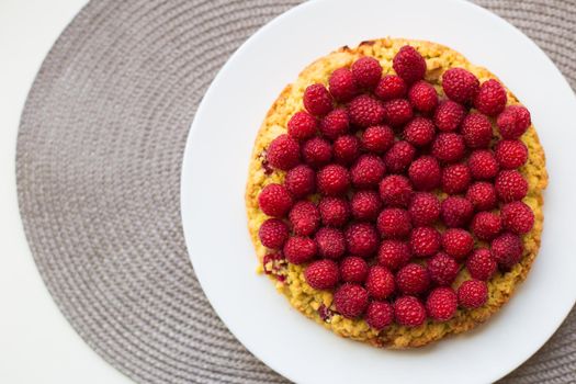 bright raspberry cake lying on a plate