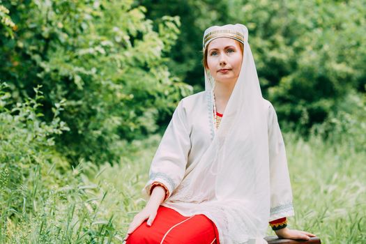 happy woman pagan priestess prepared for the ceremony. old faith in our time. seasons, summer