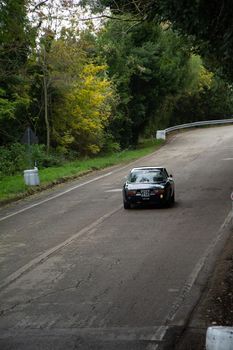 PESARO COLLE SAN BARTOLO , ITALY - OTT 10 - 2021 : ALFA ROMEO JUNIOR SCALINO on an old racing car in rally