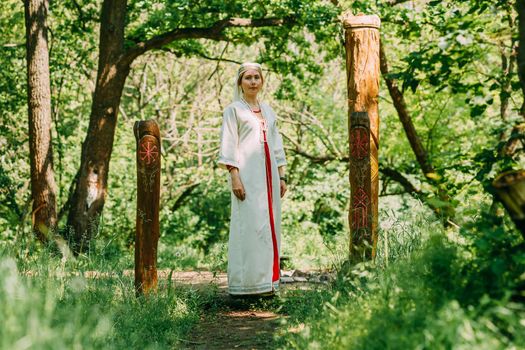 happy woman pagan priestess prepared for the ceremony. old faith in our time. seasons, summer