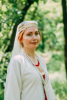 happy woman pagan priestess prepared for the ceremony. old faith in our time. seasons, summer