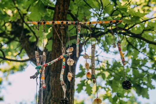 pagan devices hang on a tree