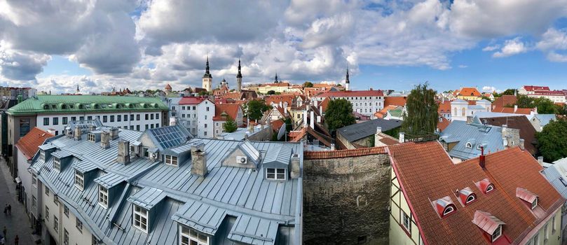 The walls and towers of Tallinn, Estonia. Cityscape panorama of Old Town with historical buildings