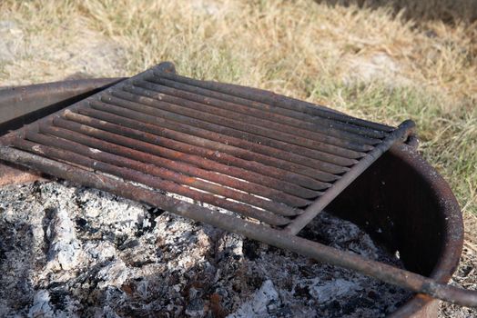 Rusty old BBq grill at campsite needs replacing