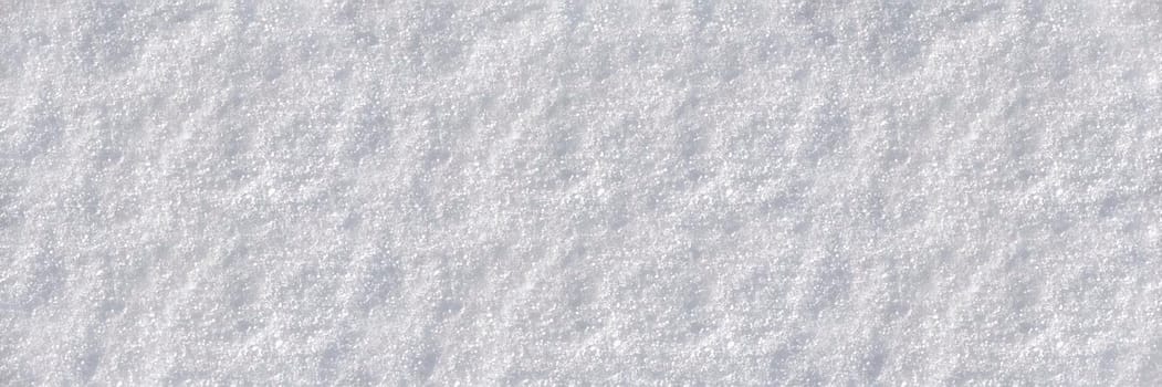 White clean snow background texture. Texture of white snow. Snow surface