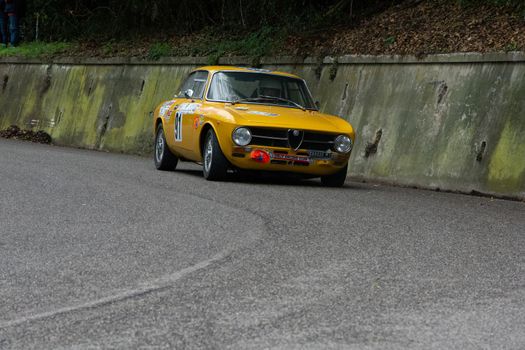 PESARO COLLE SAN BARTOLO , ITALY - OTT 10 - 2021 : ALFA ROMEO JUNIOR SCALINO on an old racing car in rally