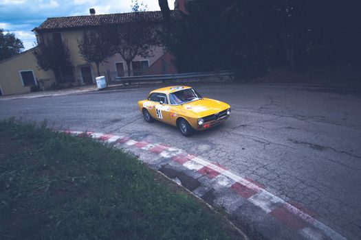 PESARO COLLE SAN BARTOLO , ITALY - OTT 10 - 2021 : ALFA ROMEO JUNIOR SCALINO on an old racing car in rally