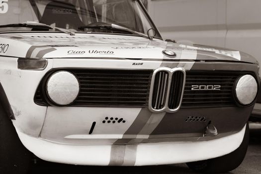 PESARO COLLE SAN BARTOLO , ITALY - OTT 10 - 2021 : BMW 2002 on an old racing car ifor rally