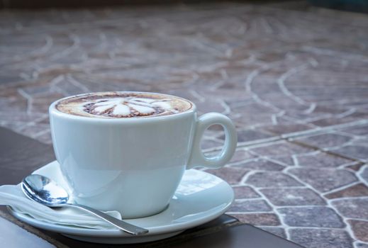 Hot mocha coffee. Cup of hot coffee with beautiful art. Morning Breakfast with coffee latte art.