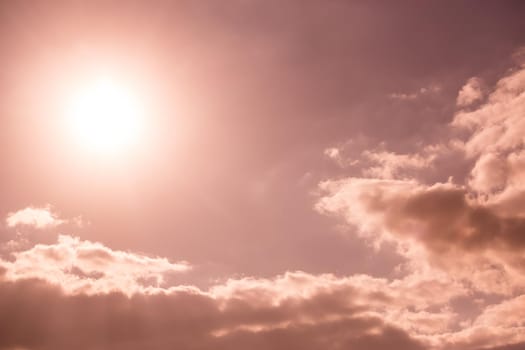Beautiful dark sky with sun and clouds