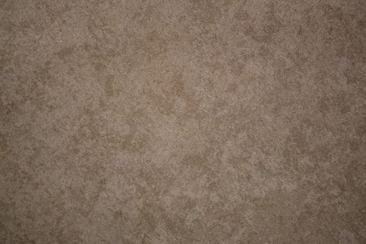 Spotted abstract textural brown background