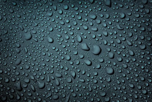 water drops on blue background close-up background