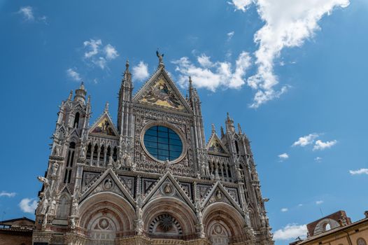 facade of the cathedral of siena in piazza duomo