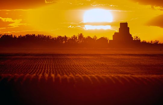 Bright colorful sunset in Saskatchewan Canada Grain Elevator