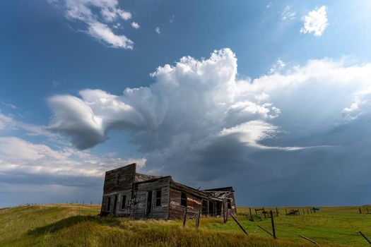 Prairie Storm Canada Summer time clouds abandoned building