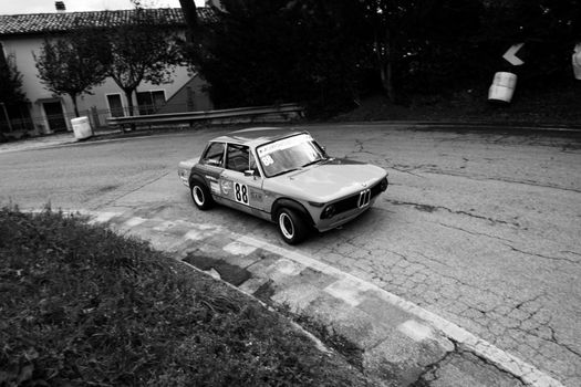 PESARO COLLE SAN BARTOLO , ITALY - OTT 10 - 2021 : BMW 2002 on an old racing car ifor rally