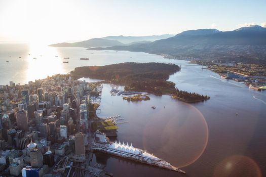 Beautiful Aerial View of Vancouver Downtown, British Columbia, Canada, during a bright spring sunset.