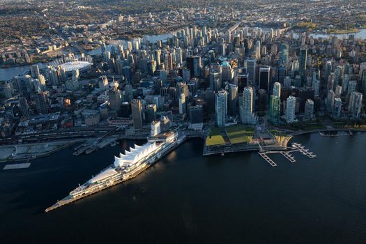 Aerial View of Vancouver Downtown, British Columbia, Canada, during a bright spring sunset.