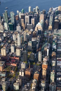 Aerial view on the buildings in Downtown Vancouver, British Columbia, Canada, during a sunny evening.