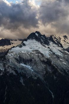 Aerial landscape view of Mount Tantalus. Picture taken near Squamish, BC, Canada, during a cloudy sunset.